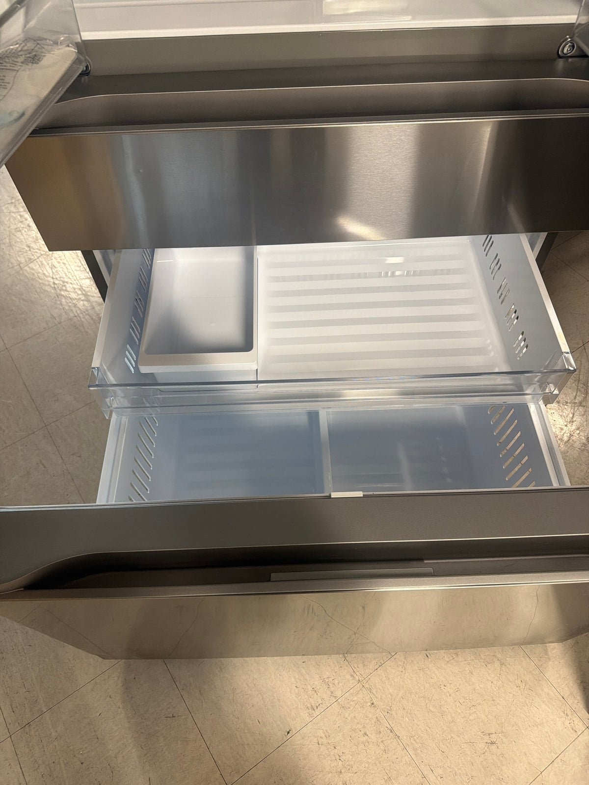 LG 4-Door refrigerator with internal water dispenser